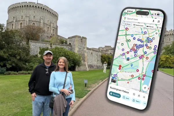 Man and woman posing in front of Windsor Castle after using a Top rated London Travel Guide