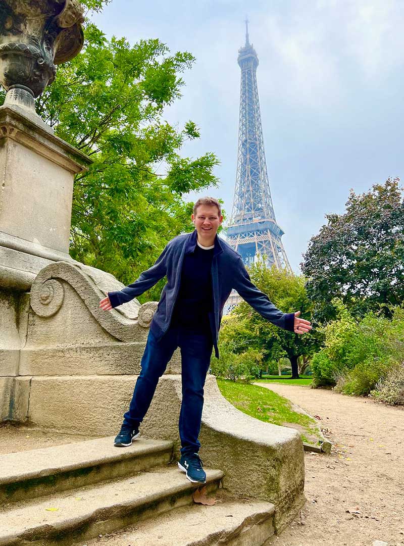 Man in front of Eiffel Tower